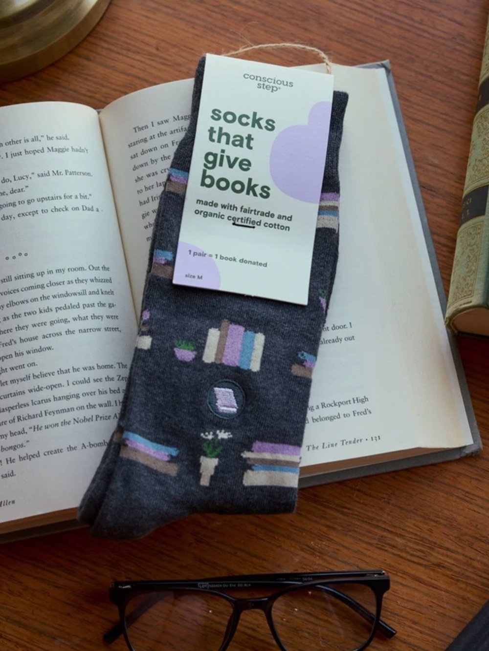 NWT Conscious Steps Socks That Give Books
Medium organic Cotton